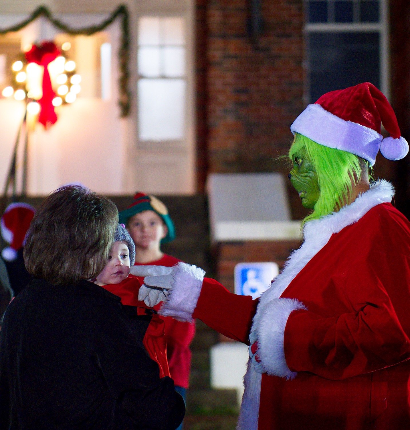The Grinch has become a fixture at gatherings in December and Quitman's Hometown Christmas event was no exception. [see more of the festivities]